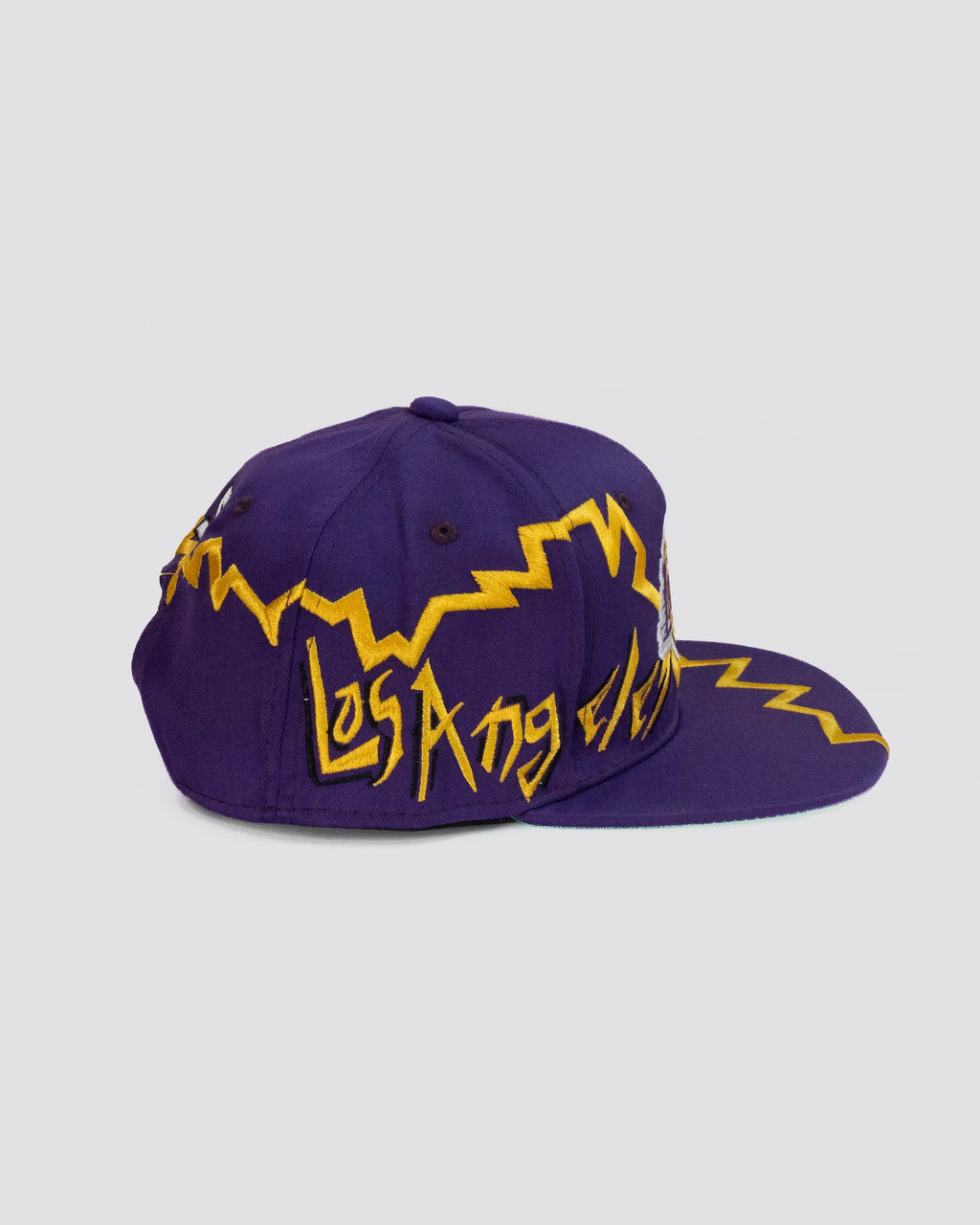 Gorra DESTELLO LAEKERS MORADA lado