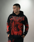 Detalle del buzo negro del conjunto Liberty con el lettering y la Estatua de la Libertad en rojo